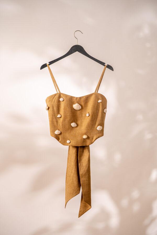 Bold top in sand coloured linen with decorated seashells
