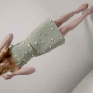 Bold top in green with decorated seashells