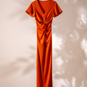 Long orange dress with pearls